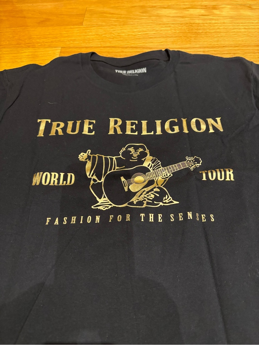 True Religion Black Tee with Gold Logo and Guitar Buddha